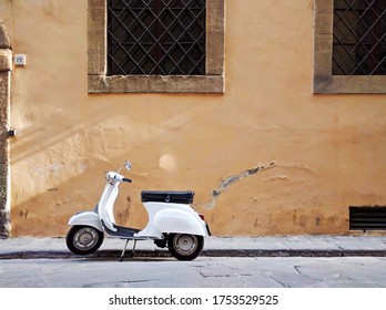 Rome - 26 May 2016 - View Of Traditional White Moped On Rusitc Italian Street In Rome, Italy