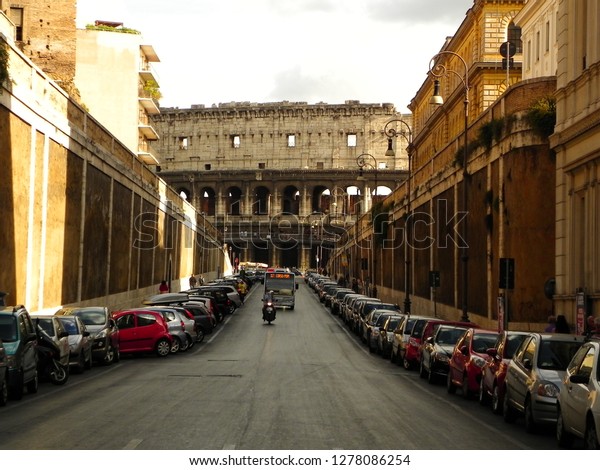 Rome coliseum\
street italy motorcycle old\
cars