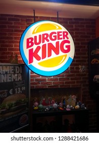 Rome, December 28, 2018: illuminated sign of Burger King in a showcase of one of his premises