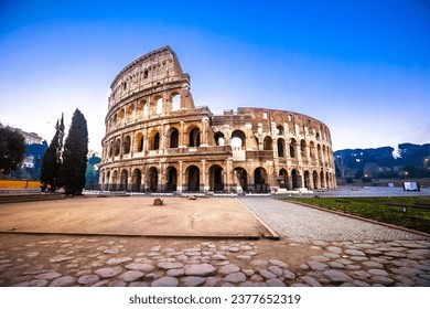 Rome. Empty Colosseum square in Rome dawn view, the most famous landmark of eternal city, capital of Italy