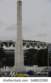 Rome, Italy, About 02/2017. Monolith Obelisk In White Carrara Marble Dedicated To Mussolini Located At The Olympic Stadium In Rome.