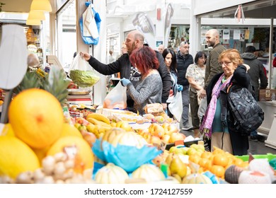 Rome (Italy), April 2019.
People Shopping And Enjoying The Mercato Di Testaccio.