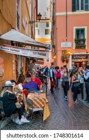 ROME, ITALY - APRIL 29, 2018 : Unidentified People At Street Restaurant In Rome, Italy.