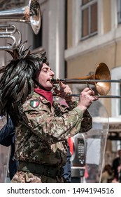 Rome, Italy - April 7, 2019: The Bersaglieri Army band performing in the street during the 25th edition of the annual Rome Marathon.