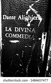 Rome, Italy - August, 20 2019, An Old Book Damaged On The Divine Comedy By The Great Poet Dante Alighieri.