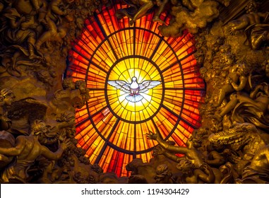 ROME, ITALY - AUGUST 24, 2018: Throne Bernini Holy Spirit Dove Saint Peter's Basilica Vatican Rome Italy. Bernini created Saint Peter's Throne with Holy Spirit Dove Stained Glass Amber in 1600s