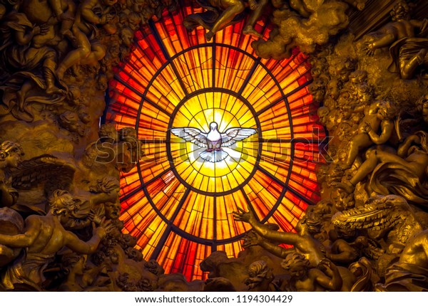 ROME, ITALY - AUGUST 24, 2018: Throne Bernini Holy\
Spirit Dove Saint Peter\'s Basilica Vatican Rome Italy. Bernini\
created Saint Peter\'s Throne with Holy Spirit Dove Stained Glass\
Amber in 1600s