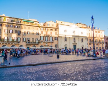 ROME, ITALY - AUGUST 27, 2017 - Unidentified people watching a show in Piazza Navona. 