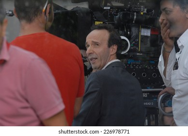 ROME, ITALY - AUGUST 8, 2011: Italian actor Roberto Benigni during the filming of the movie "To Rome with Love", directed by Woody Allen. A break in the film.