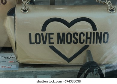 Rome, Italy - August 9, 2017: Love Moschino Bag In Window Display. Moschino Is An Italian Luxury Fashion House, Specialized Ready-to-wear, Leather And Fashion Accessories, Shoes, Luggage, Perfume