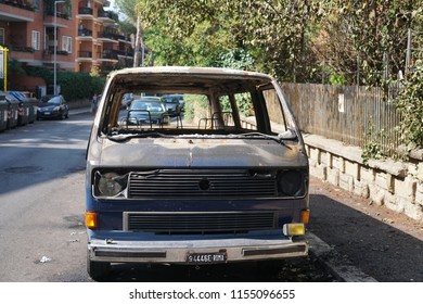 Rome, Italy - August 9, 2018: Completely burnt out van