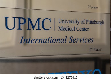 Rome, Italy - August 9, 2018: Sign Of University Pittsburgh Medical Center (UPMC), A $19 Billion Integrated Global Nonprofit Health Enterprise