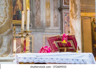 ROME, ITALY - CIRCA JANUARY 2016 - Altar with covered chalice and Missal during a traditional extraordinary form old latin rite Mass in the basilica of St Nicholas in Rome