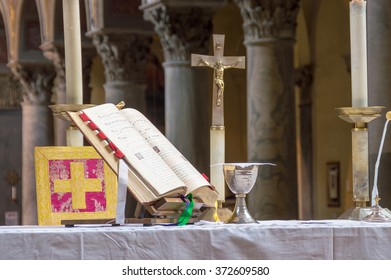 ROME, ITALY - CIRCA JANUARY 2016 - Altar with chalice and Missal during a traditional old latin rite Mass in the basilica of St Nicholas in Rome