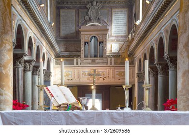 ROME, ITALY - CIRCA JANUARY 2016 - Altar with chalice and Missal during a traditional old latin rite Mass in the basilica of St Nicholas in Rome