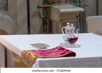 ROME, ITALY - CIRCA JANUARY 2016 -  Ampules, glass cruets with wine and water for the Holy Mass in Catholic church of St Nicholas in Rome