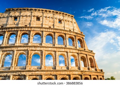 Rome, Italy. Colosseum in Roma, Italia. Symbol of the ancient city. Amphitheatre in sunset light.