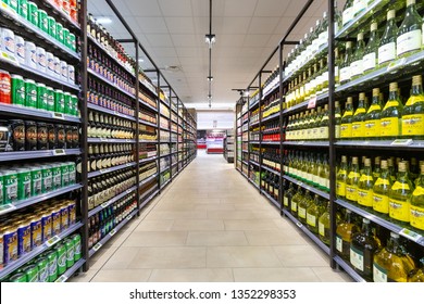 Rome, Italy. December 05, 2018: Wine And Beer Shop With A Wide Display Of Bottles Of Wine Department Products Inside A MA Supermarket In Italy In Rome. Aisle With Shelves Full Of Bottles.