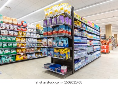 Rome, Italy. December 05, 2018: Food department for dogs and cats. Shelving with various types of food for pets inside a MA supermarket in Rome in Italy. 