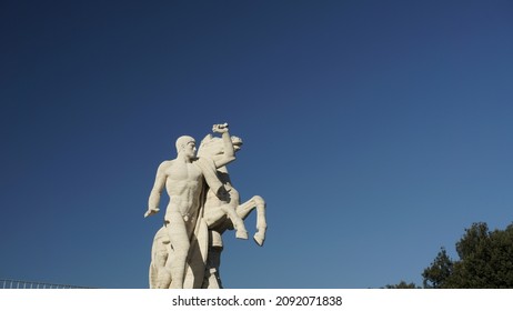 Rome, Italy - December 14, 2021, Detail Of A Travertine Statue Near The Palazzo Della Civiltà Italiana.