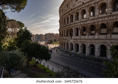 Rome, Italy, Feb 12th 2020, Biased View Of The Roman Colosseum Early In The Day With A Blue Sky