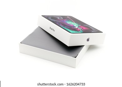 Rome, Italy - Jannuary 2020: Apple IPad Pro 2019 Unboxing On A White Background Isolated. Open IPad Pro 11 Inch Box With Cover And Box Containing The New IPad Still Wrapped