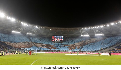 Rome, Italy, January 26, 2020. Lazio Fans Wave Flags During The Serie A Soccer Match Between Roma And Lazio At The Olympic Stadium. 