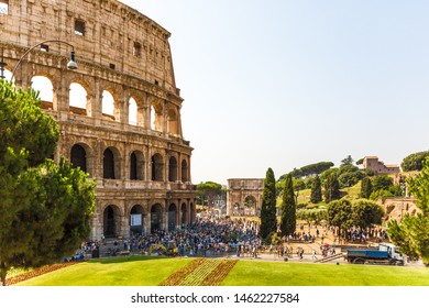 Rome, Italy - July 15th 2015: A Crowd Of Tourists Visit The Colosseum, Also Know As Flavian Amphitheatre Or Colosseo, An Oval Amphitheatre East Of The Roman Forum In The Historical City Of Rome, Italy