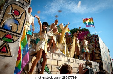 ROME, ITALY - JUNE 11 2011. Euro Gay Pride Day, Parade People On City Streets During The Demonstration. Group Of People Celebrating On A Float.