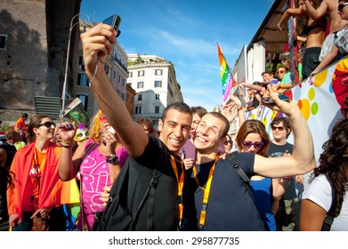 ROME, ITALY - JUNE 11 2011. Euro Gay Pride Day, Parade People On City Streets During The Demonstration. People Taking A Selfie