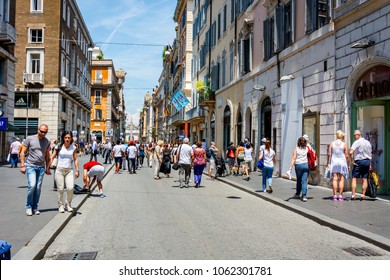 Rome, Italy, June 2015: Romans And Tourists Strolling Along The Famous Via Del Corso Shopping Street In Rome On A Sunny Day In Early Summer