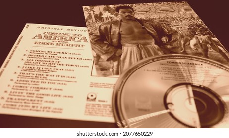 Rome, Italy - March 16, 2020: Cd and artwork of the soundtrack of the film with eddie murphy COMING TO AMERICA. a 1988 comedy by John Landis, it had a worldwide grossing of over $ 288,752,301