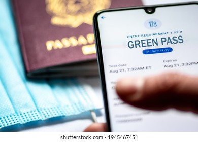 Rome, Italy, - March 17 2021: Green Or Covid Pass. EU Digital Certificate Covid-19. Covid Or Coronavirus Vaccine Certificate, Passport App With Passport And Mask On Background 