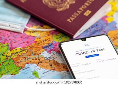 Rome, Italy, - March 2 2021: Covid Test. European Union Pass To Allow Free Travel By Summer. Covid Or Coronavirus Vaccine Certificate Or Passport App With Passport, Mask And Map Of Europe