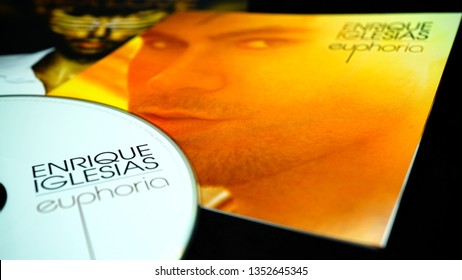 Rome, Italy - March 23, 2019: CDs and artwork of spanish singer, songwriter, actor and record producer ENRIQUE IGLESIAS. He is widely regarded as the King of Latin Pop