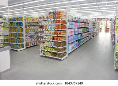Rome, Italy. March 26, 2014: Shelving with groceries inside a grocery store in the city of Rome in Italy. Variety of food products and detergents.