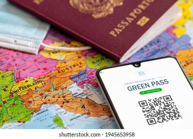 Rome, Italy - March 29 2021: Green Or Covid Pass. EU Digital Certificate Covid-19. Covid Or Coronavirus Vaccine Certificate, Passport App With QR Code, Passport, Mask And Map Of Europe