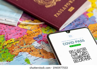 Rome, Italy - March 29 2021: Covid Pass. EU Digital Certificate Covid-19. Covid Or Coronavirus Vaccine Certificate, Passport App With QR Code, Passport, Mask And Map Of Europe