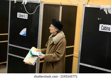 Rome, Italy - March 4 2018: A Voter Enters A Polling Station  To Cast Their Ballot During Italian General Election In Rome.