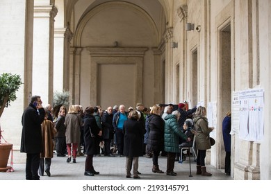 Rome, Italy - March 4 2018: Voters Wait In Line To Cast Their Ballot Outside A Polling Station During Italian General Election In Rome.