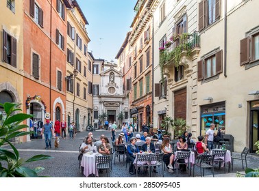 ROME, ITALY - MAY 05, 2015 : Unidentified People At Street Restaurant In Rome, Italy.