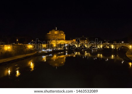 Rome Italy. Night View of famous Sant Angelo Bridge and The Mausoleum of Hadrian, known as the Castel Sant Angelo. River Tiber.