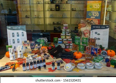 ROME, ITALY - November 10 2019: Display Case In A Retail Store Selling Many Types Of CBD Oil Products, Made From Hemp. Legal Marijuana Buds And Hash For Sale. Marijuana Cannabis Liquid For Vaping.