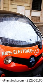 Rome, Italy - November 28, 2021: Detail Of Mini Renault Car In Sharing, With Written On The Bonnet In Italian, 100% Electric. Image For Ecological Transition, Energy Saving