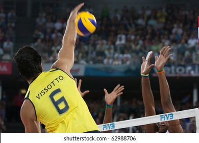 ROME, ITALY - OCTOBER 10: Brazil GLeandro Vissotto Neves spikes ball at Volleyball World Championships  final match Brazil vs Cuba at Palalottomatica in Rome on October 10, 2010