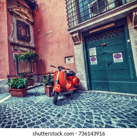 Rome, Italy - October 13, 2017: Vespa Parked In A Picturesque Corner 