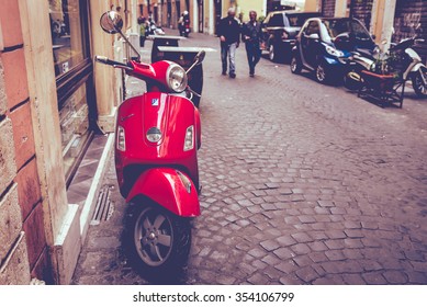 Rome, Italy - October 20, 2014: Old Red Vespa Parked On Old Street In Rome, Italy.