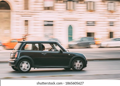 Rome, Italy - October 21, 2018: Mini One Hatch Mini Cooper Car Driving On City Street