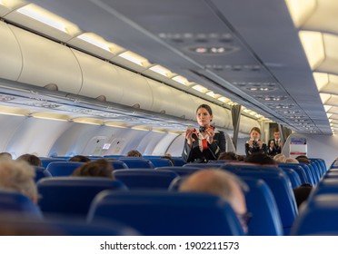 ROME, ITALY - OCTOBER 23, 2019: Aeroflot Russian Airlines Cabin Crew Safety Demonstration In Airplane Before Departure.