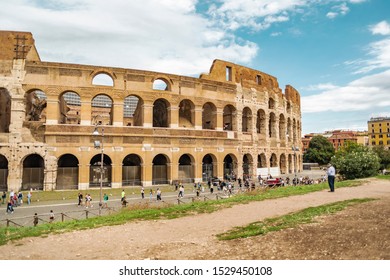 Rome, Italy - October 3, 2019: Crowd Of Tourists In Front Of The Ancient Colosseum Or Coliseum, Also Known As Flavian Amphitheatre In The City.
